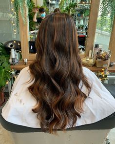 Here's a fabulous hairstyle from our balayage specialist. Visit our salon to try out this dark brown balayage hair. balayage on dark brown hair // dark brown balayage // brown balayage hair #balayage #balayaged #highlighte #highlights