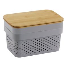 a gray basket with a wooden lid and perforated sides on a white background