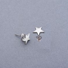 Sterling Silver Tiny Star Stud Earrings , 925 Sterling Silver Star Earrings Push Back , Silver Stud Earring , Dainty Silver Star  Earring * Materials: Sterling Silver * Color: Silver * Earring Style Cut: Star Stud Earring * Size:9 mm * Quantity: One pair * Made to Order These 925 sterling silver minimalist earring perfect for daily wear. Their simple and stylish design makes the mealy to pair with an outfit. Made from high-quality silver, they are durable and comfortable, perfect for everyday us Sterling Silver Star Earrings, Star Earring, Silver Star Earrings, Minimalist Earring, Star Stud Earrings, Tiny Star, Star Earrings Stud, Star Studs, Design Simple