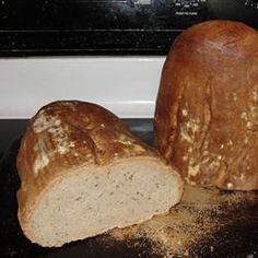 a loaf of bread sitting on top of an oven