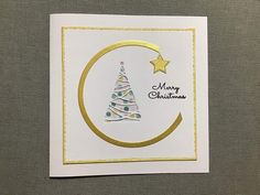 a card with a christmas tree on it