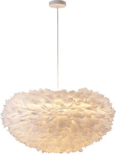 a large white chandelier hanging from a ceiling fixture with feathers on the bottom