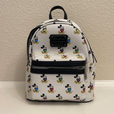 Brand New Loungefly Backpack With Rainbow Colored Mickie Mouses White Mickey Mouse Backpack For Travel, White Mickey Mouse Travel Backpack, White Mickey Mouse Backpack For Disney Trips, Multicolor Mickey Mouse Backpack, Casual Minnie Mouse Backpack For Disney Trips, Casual Minnie Mouse Backpack, Casual Minnie Mouse Standard Backpack, Casual Mickey Mouse Backpack For Travel, Casual Mickey Mouse Backpack