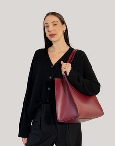 Named after the neighboring town to our Italian Factory, the Tolentino Tote is the epitome of upcycled luxury. Seamlessly lined in Hermés leftover leathers, its double-face construction is lightweight and spacious, easily fitting a 16" laptop (measured diagonally). Designed to stand upright when you put it down, it's structured but not stiff. A barely noticeable exterior slash pocket perfectly holds your phone, while convenient interior pockets hold your sunglasses and more, not to mention the interior key rings. A magnetic snap closure provides easy access to the effortless organization. This quiet luxury tote bag is thoughtfully designed to quietly work hard while you're working hard.