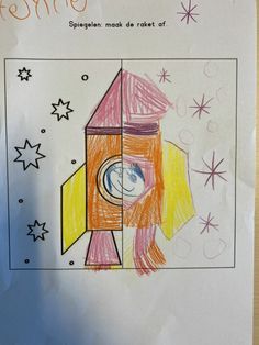 a child's drawing of a rocket ship