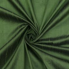 an image of a green fabric textured with metallic foiling on the outside and inside