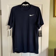 Nike T-Shirt Size L Navy Blue T-Shirt / Slim Fit / Dri-Fit Brand New With Tags From Cat Friendly, Smoke Free Home Nike Air Shirt, Nike Stuff, Red Sox Shirt, Tennessee Shirt, Shirts Nike, Wishlist 2024, Navy Blue T Shirt, Mens Workout Shirts, Blue Crewneck