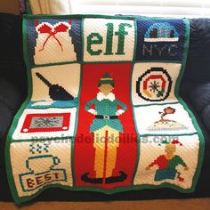 a crocheted blanket with pictures of people on it and the words elf written across them