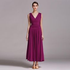 a woman in a long purple dress