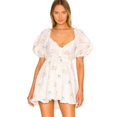 Yolonda Puff Sleeve Mini Dress In White For Love & Lemons Size Small Sold Out!! Nwt And In Perfect Condition. Comes With A Fitted Bodice, Sweetheart Neckline, Puff Sleeves, Flared Skirt, Eyelet Details, Zip Closure, And Flower And Mushroom Print All Over. Product Measurements: Shoulder Seam To Hem Measures Approx 29.5" In Length Product Details Cotton Blend Dry Clean Recommended Fully Lined Hidden Back Zipper Closure Puff Sleeves With Elastic Edges Ruffle Trim At Neckline And Hem Embroidered Flo Feminine Puff Sleeve Mini Dress For Daywear, Feminine Daywear Mini Dress With Puff Sleeves, White Feminine Mini Dress With Puff Sleeves, White Puff Sleeve Feminine Mini Dress, Puff Sleeve Dress With Sweetheart Neckline For Brunch, White Feminine Puff Sleeve Mini Dress, White Fitted Puff Sleeve Dress With Floral Print, Feminine White Mini Puff Sleeve Dress, Feminine White Puff Sleeve Mini Dress