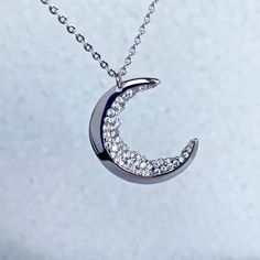 "Crescent Moon Necklace for Mom Friendship Jewelry This necklace features black cubic zirconias to accent the crescent moon and which look like a moon landscape.It is the perfect birthday, anniversary, or Christmas gift that adds shine to just about any outfit, Mothers day gift. Each item is made-to-order, which gives our pieces a unique meaning that is specific and special to you. Measurements: The moon is around 1\" (2,5 cm). The necklace is 16\" (50 cm). Moon jewelry: https://www.etsy.com/sho Silver Cubic Zirconia Moon Necklace, Crescent Moon Charm Necklace For Anniversary, Half Moon Phase Necklace For Anniversary, Anniversary Crescent Moon Charm Necklace, Moon-shaped Cubic Zirconia Jewelry For Gifts, Moon Shaped Cubic Zirconia Jewelry For Gift, Cubic Zirconia Moon Charm Jewelry, Moon Phase Necklace For Anniversary, Silver Crescent Jewelry With Cubic Zirconia