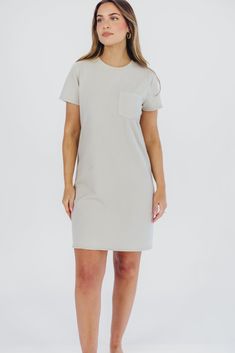 The ultimate travel dress just hit our shelves - meet the Raiya T-Shirt Dress, your new go-to! This cotton-blend mini dress is relaxed and comfortable without sacrificing style; dress it up with mules or wedges, or dress it down with sneakers for versatile, multi-season wear! FIT: Runs true to size. MATERIAL: 60% Cotton, 40% Polyester. Hand wash cold. GARMENT DETAILS: Relaxed fit t-shirt dress in a mini length, with high crewneck, short sleeves, and single chest pocket. SIZE GUIDE: XS (0-2) / S (2-4) / M (6-8) / L (10-12) MODEL DETAILS: Mackenzie - Size S Heather - Size S Molly - Size XL Our Brunette Misses Model Our Blonde Misses Model Our Blonde Curve Model Bust 34" 34" 37" Waist 27.5" 27.5" 32" Hips 40.5" 37.5" 47" Height 5'7" 5'7" 5'7"