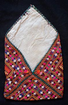 This is a beautiful and very fine embroidery from the Sindh area of Pakistan or Baluchistan silk embroidered bohcha.  These were used to wrap small Korans to protect them or to hold valued objects.  The workmanship is of very very high quality and hand done. -Sindh or Baluch embroidery-High quality workmanship-Rare Traditional Ceremonial Embroidered Fabric With Handwork, Bohemian Style Ceremonial Dupatta With Intricate Embroidery, Transitional Season Embroidered Traditional Wear For Rituals, Ceremonial Dupatta With Multicolor Embroidery And Handwork, Ceremonial Multicolor Embroidered Fabric With Handwork, Traditional Festival Dupatta With Intricate Embroidery, Traditional Intricately Embroidered Dupatta For Festival, Traditional Dupatta With Intricate Embroidery For Festival, Traditional Multicolor Embroidered Fabric For Ceremonial Use