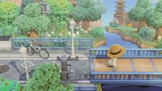 an animal crossing a bridge over a river with a person wearing a hat on it