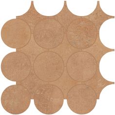 a beige tile with circles on the bottom and sides, all in different sizes or shapes