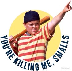 a young boy holding a baseball bat with the words you're killing me smalls on it