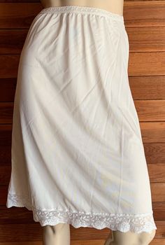 VINTAGE OFF WHITE HALF SLIP there is no size tag, appears to be medium COLOR IS OFF WHITE 100% NYON WAIST    24 - 34 INCHES HIPS    36 INCHES 46" SWEEP LENGTH    25 INCHES VINTAGE, IN GREAT CONDITION Inv # 13533 Please see other items in my ebay store, ReallyCoolClothes.  Happy Bidding! Half Slip, Lace Slip Dress, Lace Slip, Size Tag, Ebay Store, Slip Dress, Slip On, Off White, Size Medium