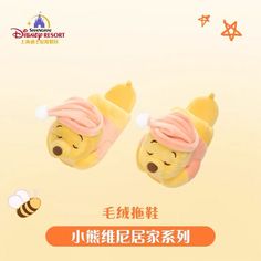 winnie the pooh slippers with pink hair and bee on them are featured in an advertisement for disney resort