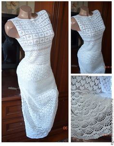 a white crocheted dress on display next to a mannequin