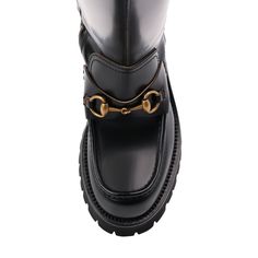 The Horsebit detail is a key Gucci motif, appearing throughout the house's collections. It can be seen to the front of these boots, speaking to the equestrian inspiration behind the pair.Signature Horsebit detailPanelled designRound toeSide zip fasteningKnee-highChunky rubber soleLow block heel ~1.73"Composition: Leather 100%Sole: Rubber 100%Lining: Leather 100%Made in Italy Black Gucci Boots For Business, Gucci Round Toe Boots For Workwear, Gucci Boots For Workwear, Classic Gucci Boots For Work, Elegant Gucci Boots For Business, Classic Gucci Boots With Leather Lining, Gucci Black Business Boots, Leather Boots With Horsebit Detail For Work, Gucci Calf Leather Boots For Fall