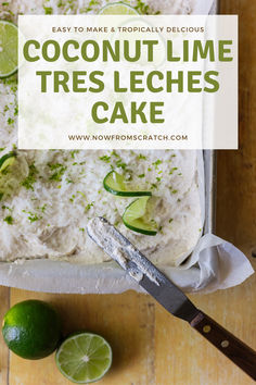 coconut lime tres leches cake on a cutting board with limes and a knife