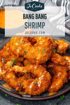 a plate full of bang bang shrimp with dipping sauce