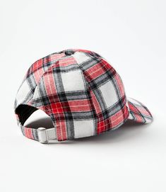 a red, white and black plaid hat on a white background with clipping around the brim