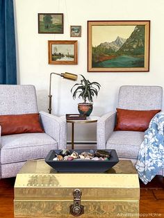 a living room with two couches and a coffee table