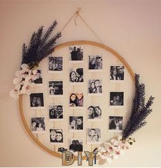 a circular frame with pictures and flowers hanging on the wall