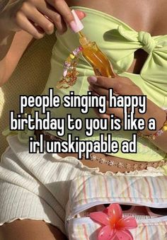 a woman sitting down with her stomach exposed and the words people singing happy birthday to you is