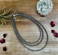 Build your own ! pick the size of the sterling silver pearls 4-5-6 mm and pick the length hand strand in Texas. come with sterling silver .925 lobster and chain For the best layering photo show : 14 inch 4 mm 16 inch 6 mm 18 inch 5 mm