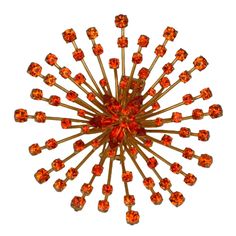 Unusual and massive French starburst fur clip, each spike hand set with graduated orange crystals. The center flowerhead is set with marquise and round graduated orange crystals. Dimensional and striking. 4 1/8" across. Handmade France 1950's. Excellent condition. Broche Chanel, Starburst Mirror Wall, Spiked Jewelry, Interesting Jewelry, Bordeaux Wine, Gold Starburst, Art Deco Brooch, Starburst Earrings, Orange Crystals