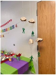 a table with some decorations on it in front of a door