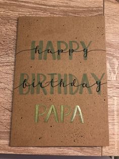 a birthday card with the words happy birthday papa written on it in green ink