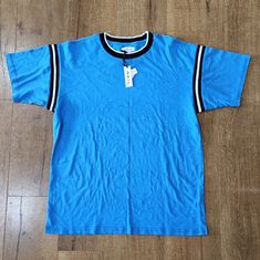 Ultra Soft Luxury Men's Tee Shirt. It Is In Beautiful Vivid Blue Color With Striped Ribbed Detailing On The Sleeves And The Neckline. A Great Everyday Style. Brand: The Rail Size: Medium Fabrication: 100% Cotton Measurements: Taken Flat And Are Approximate Pit To Pit: 23" Pit To Hem: 18.5" High Point Shoulder To Hem: 29.5" Sleeve Length: 8" This Piece Is In Unworn New With Tags Condition Casual Blue Tops For College, Blue Sporty Shirt With Relaxed Fit, Blue Summer Shirt For College, Blue Relaxed Fit Sporty Shirt, Blue Sporty Relaxed Fit Shirt, Color Block Tshirt, Blue T-shirt With Three Stripes For Streetwear, Blue Short Sleeve T-shirt With Three Stripes, Blue Short Sleeve T-shirt With Contrast Stripes