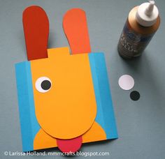 an animal made out of construction paper and glue