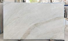 a large white marble slab in a warehouse