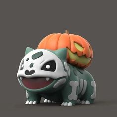 an animal with a pumpkin on its head and a cat figurine next to it