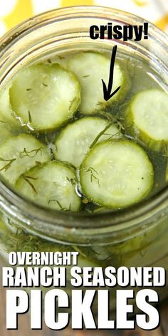 pickled cucumbers in a mason jar with text overlay that reads overnight ranch seasoned pickles