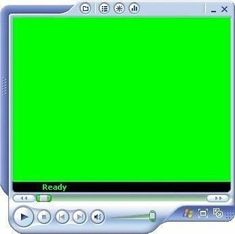 a computer monitor with a green screen on the front and side of it's display