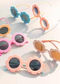 Perfect for protecting your little ones eyes in the sun, we love these colorful sunglasses for children. One size fits most children. 100% Plastic. Colorful Sunglasses, Flower Sunglasses, Peach Cream, Mood Images, Mini Accessories, Plastic Sunglasses, Teal Yellow, Heart Sweatshirt, Velvet Hair