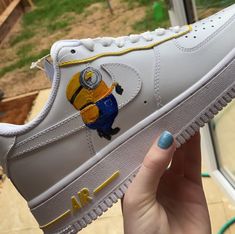 Hey my name is Ell and welcome to my page! Hand painted Minion inspired design with a yellow stitching detail. Each pair of trainers is hand painted with care. Trainers are brand new and ready for customisation.  I offer a selection of other designs, head on to my page to see what else I have to offer. Have another idea, drop me a message and we can design your dream pair of shoes together.  Average 2-3 week delivery process but drop me a message for priority postage! Happy shopping! :) Hand Painted Yellow Sneakers For Streetwear, Custom Hand Painted Yellow Sneakers, Yellow Custom Sneakers With Artwork Round Toe, Yellow Custom Sneakers With Artwork, Casual Yellow Custom Sneakers With Waterproof Paint, Yellow Custom Artwork Sneakers With Round Toe, Yellow Sneakers With Custom Artwork And Round Toe, Yellow Low-top Sneakers With Custom Artwork, Custom Yellow Sneakers For Streetwear