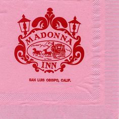 a pink napkin with the words madonna inn printed on it