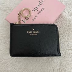 Brand New With Tag Kate Spade Card Holder With Key Ring. For Stashing Cards, I.D, Folded Bills, And Coins Offers Welcome! Kate Spade Black Bag With Card Slots, Daily Use Black Card Holder With Key Clip, Black Card Holder With Key Clip For Daily Use, Black Card Holder With Key Clip For Travel, Kate Spade Coin Purse With Card Slots, Kate Spade Bifold Coin Purse, Kate Spade Black Wallet With Interior Card Slots, Kate Spade Coin Purse With Card Slots As Gift, Chic Black Card Holder For Everyday Use