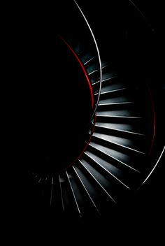 an airplane engine spinning in the dark