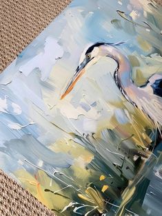 an oil painting of a heron on canvas