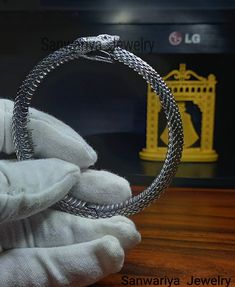 This Exclusive Ouroboros Snake Ring is Made of 925 Sterling Silver with High Polish Yellow Gold Micron Plated. ❤Metal Type - Real Sterling Silver S925, Ring Stamped With 925 ❤Band Color: Silver Oxidized, Gold Vermeil ❤For Fast Delivery Kindly Pay 30.00 USD Extra ❤The Pictures are in the Same Color & Quality ❤This is a beautiful Bracelet ❤ This ring is marked 925. Occasion: Christmas Day Gift, Father's Day, Mother's Day,  Biker Lover Ring, Anniversary Gift For Him/Her We can make personalized pendants and rings in case of special requests. Do not hesitate to contact us for more information and to learn how to create your jewel. ✦ Returns Cancellations ✦ * Return option available for 3 days after the delivery. It has to be on my hands in 14 days after dispatch. * The product has to be in the Traditional Snake Shape Jewelry Gift, Snake-shaped Metal Bracelets As Gifts, Silver Snake-shaped Bracelet As Gift, Silver Snake-shaped Bracelet For Gift, Silver Snake-shaped Bracelets For Gifts, Silver Metal Snake Bracelets, Silver Snake Shape Bracelet As Gift, Silver Metal Snake Bracelet, Silver Snake Bracelet As Gift