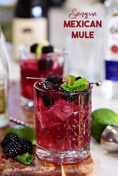 a close up of a drink in a glass on a table