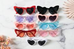 These cute heart sunglasse will be perfect for the bride and all of her babes! With so many colors to choose from, there's a shade to match every theme! Think of all the fun selfies you guys will take in your matching glasses all while looking so friggen cute! Playful Sunglasses For Party, Playful Sunglasses For Valentine's Day Party, Playful Party Sunglasses For Valentine's Day, Playful Valentine's Day Party Sunglasses, Cute Party Sunglasses With Tinted Lenses, Bridesmaid Sunglasses, Fun Selfies, Sunglasses Bride, Bride Sunglasses