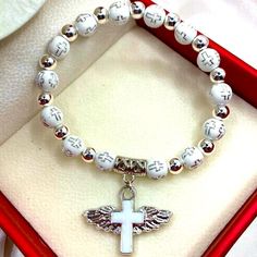 White And Silver Beaded Cross Stretchy Band Bracelet New Never Worn Will Come Gift Wrapped Cross Pendant With Wings Silver And White Bead Bracelet Is On Stretchy Sting Please See Pictures For Details B/9/B B/10/B B/11/B B/12/B B/13/B White Bead Bracelet, White Beads Bracelet, B 12, Enamel Bangle, Beaded Cross, Bohemian Bracelets, Hinged Bracelet, Band Bracelet, Amethyst Bracelet